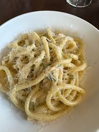 Inizio signature dishes Cacio e PepeRicotta GnocchiBucatini all'Amatriciana
